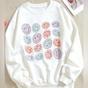 White smiley face graphic crew neck sweatshirt